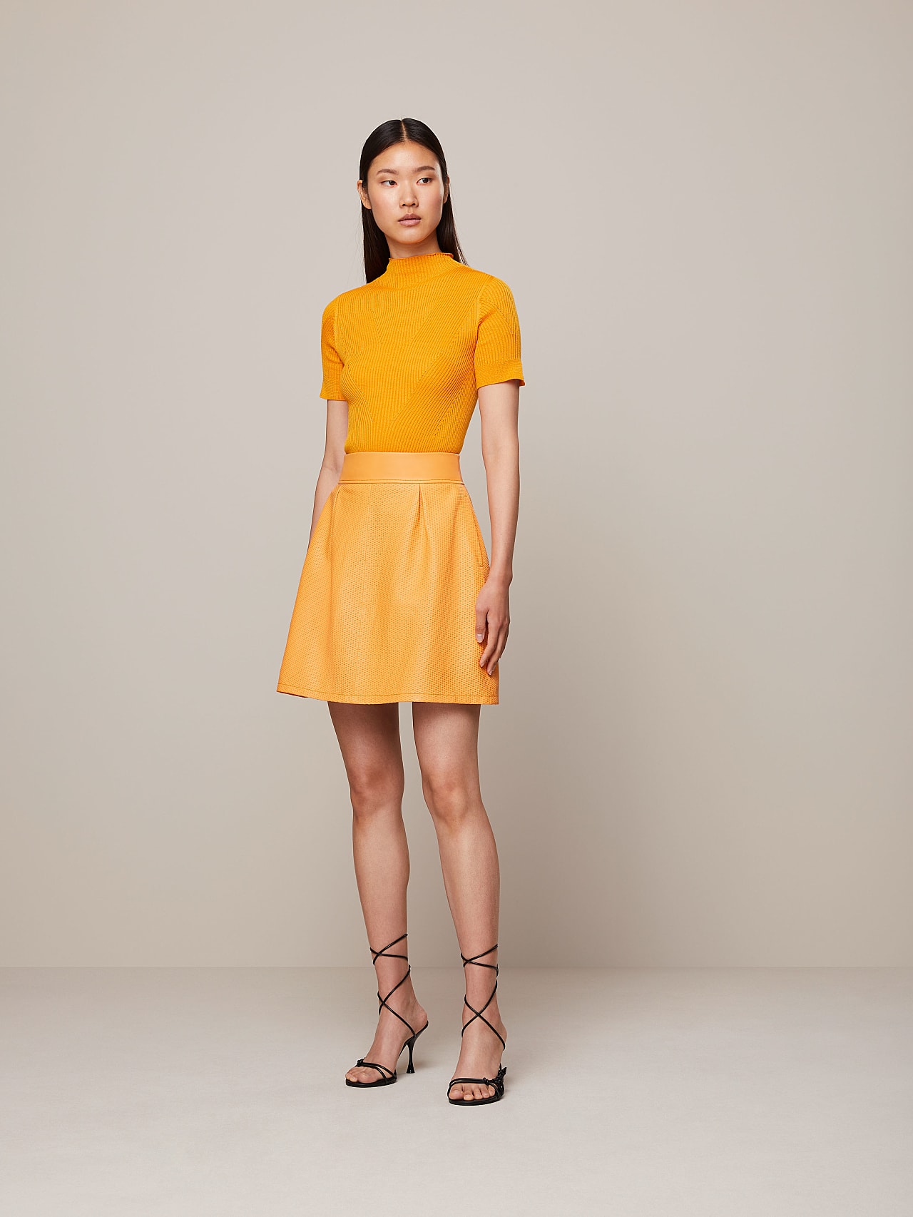 AlphaTauri | LAISK V1.Y7.01 | Jupe perforée en cuir in Jaune Chaud for Femme AlphaTauri | LAISK V1.Y7.01 | Jupe perforée en cuir in Jaune Chaud for Femme