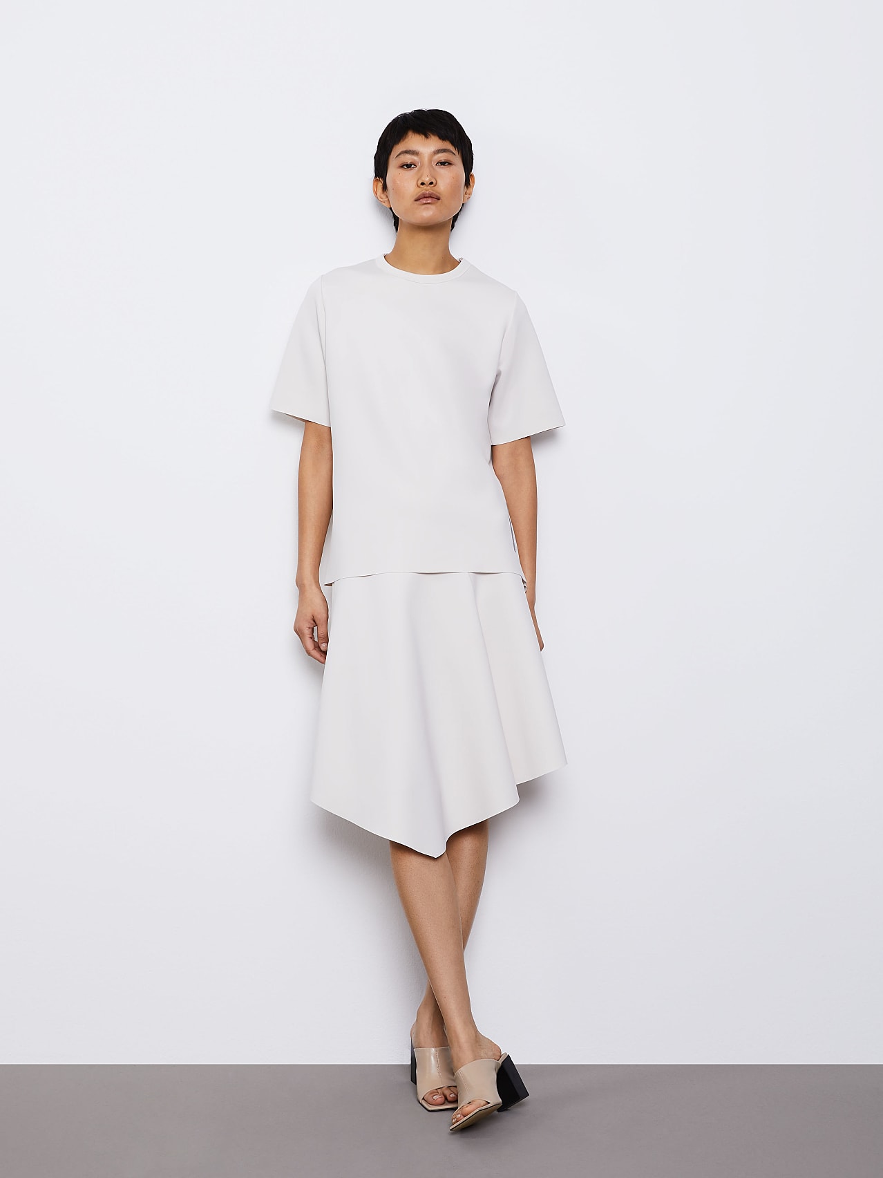 AlphaTauri | PICAS V1.Y6.01 | Jupe trapèze drapée en spacer in Blanc Cassé for Femme AlphaTauri | PICAS V1.Y6.01 | Jupe trapèze drapée en spacer in Blanc Cassé for Femme