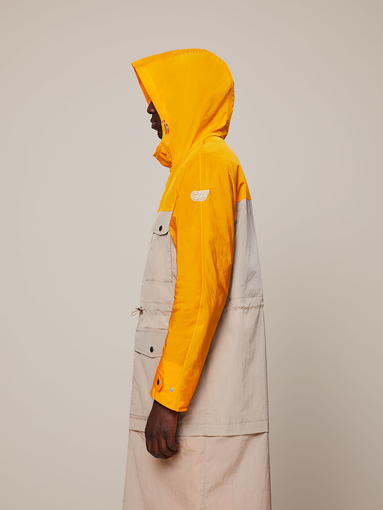 AlphaTauri | OCOAS V2.Y7.01 | Water-Resistant Summer Parka in Yellow / Brown for Men AlphaTauri | OCOAS V2.Y7.01 | Water-Resistant Summer Parka in Yellow / Brown for Men