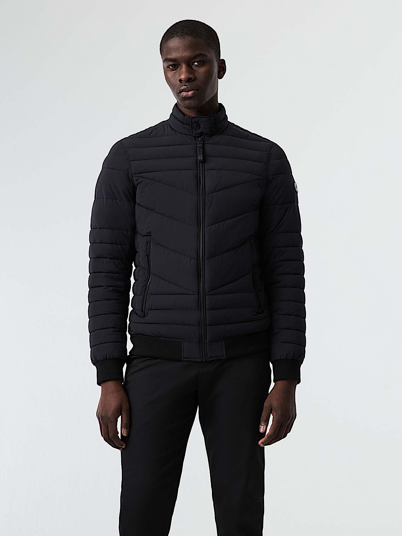 AlphaTauri | OLAT V1.Y8.02 | Lightweight Padded PrimaLoft® Jacket in Black for Men