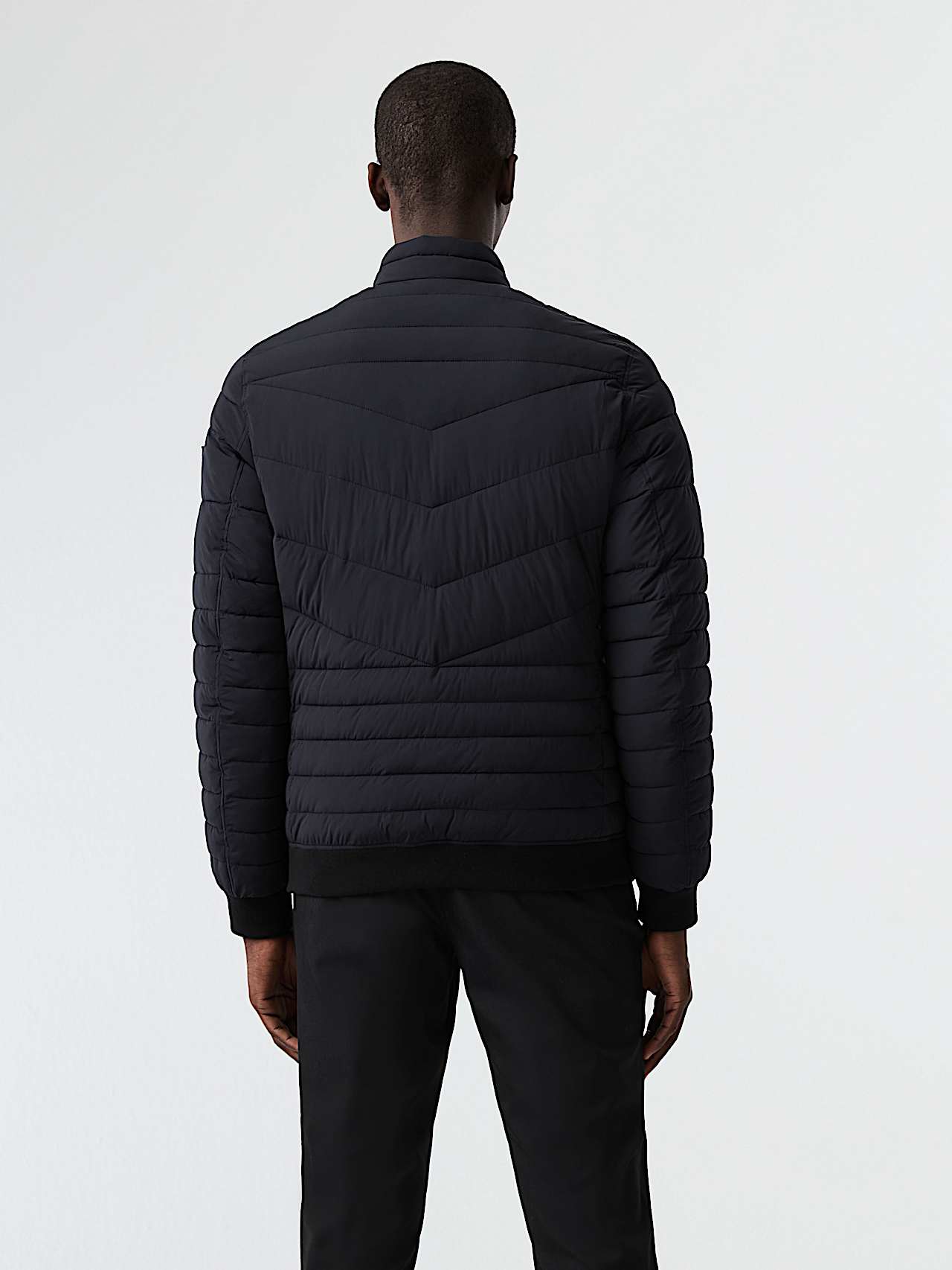 AlphaTauri | OLAT V1.Y8.02 | Lightweight Padded PrimaLoft® Jacket in Black for Men