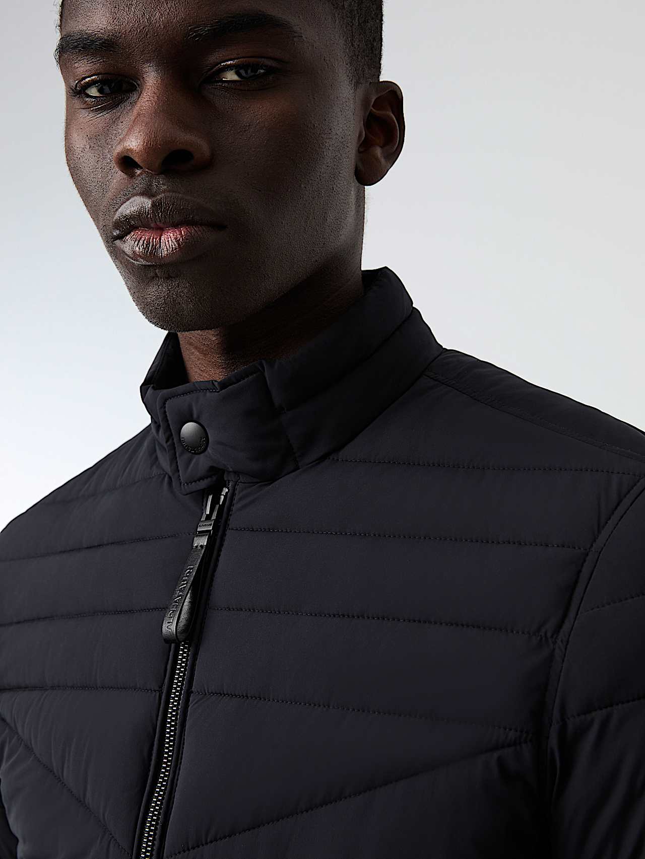 AlphaTauri | OLAT V1.Y8.02 | Leichte, wattierte PrimaLoft® Jacke in Schwarz für Herren