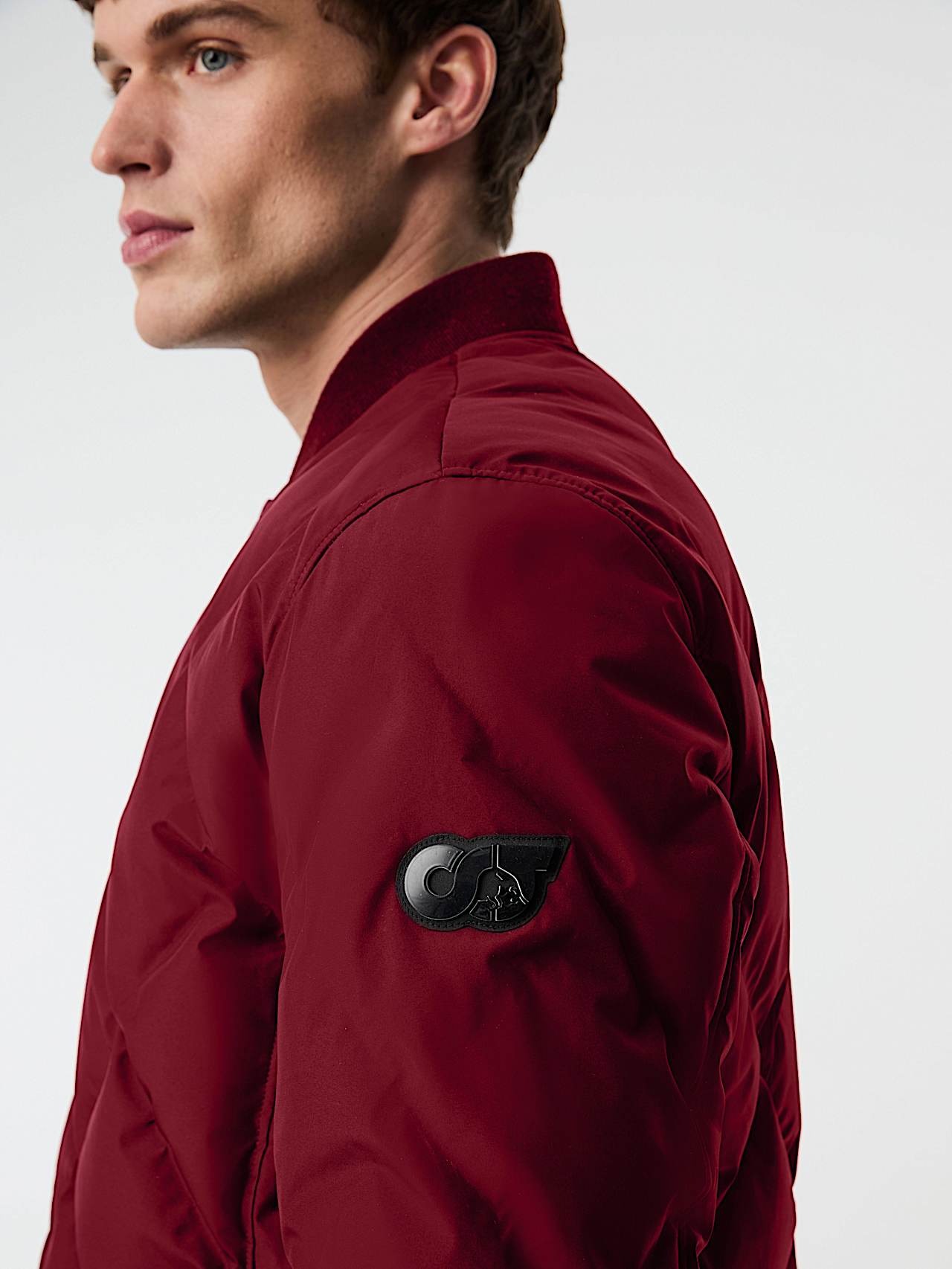 AlphaTauri | OCTAL V1.Y9.02 | Veste bomber matelassée Primaloft® in Dark Berry for Homme
