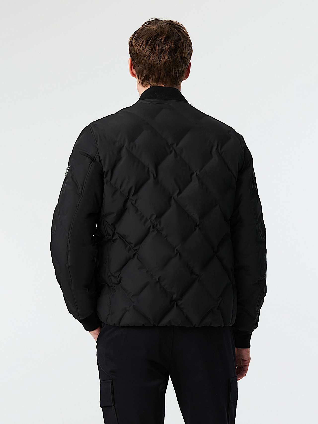 AlphaTauri | OCTAL V1.Y9.02 | Veste bomber matelassée Primaloft® in Black for Homme
