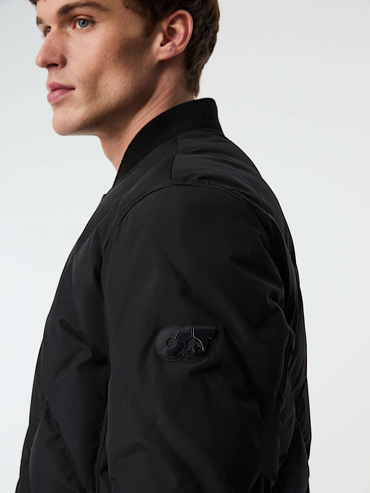 AlphaTauri | OCTAL V1.Y9.02 | Giacca bomber trapuntata Primaloft® in Black for Uomo