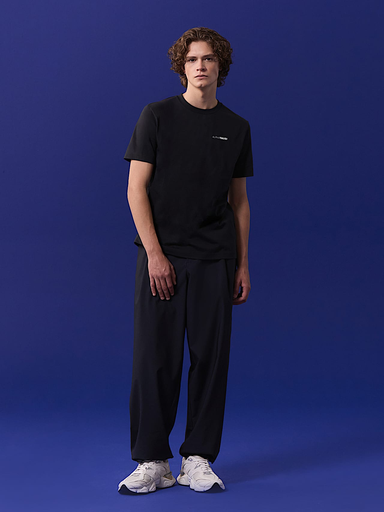 AlphaTauri | Unisex Backprint T-Shirt | Olympic Team Austria Collection in Black for Unisex AlphaTauri | Unisex Backprint T-Shirt | Olympic Team Austria Collection in Black for Unisex