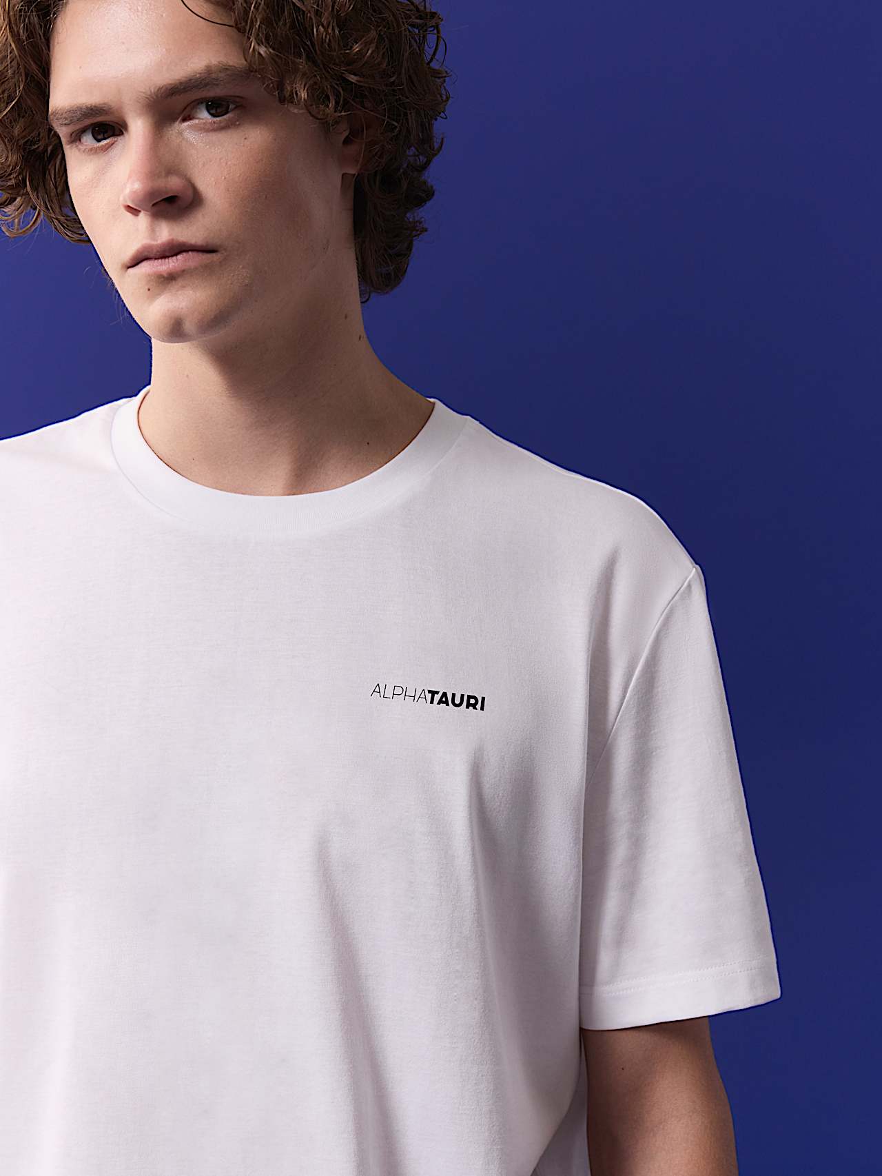 AlphaTauri | Unisex Backprint T-Shirt | Olympic Team Austria Collection in White for Unisex AlphaTauri | Unisex Backprint T-Shirt | Olympic Team Austria Collection in White for Unisex