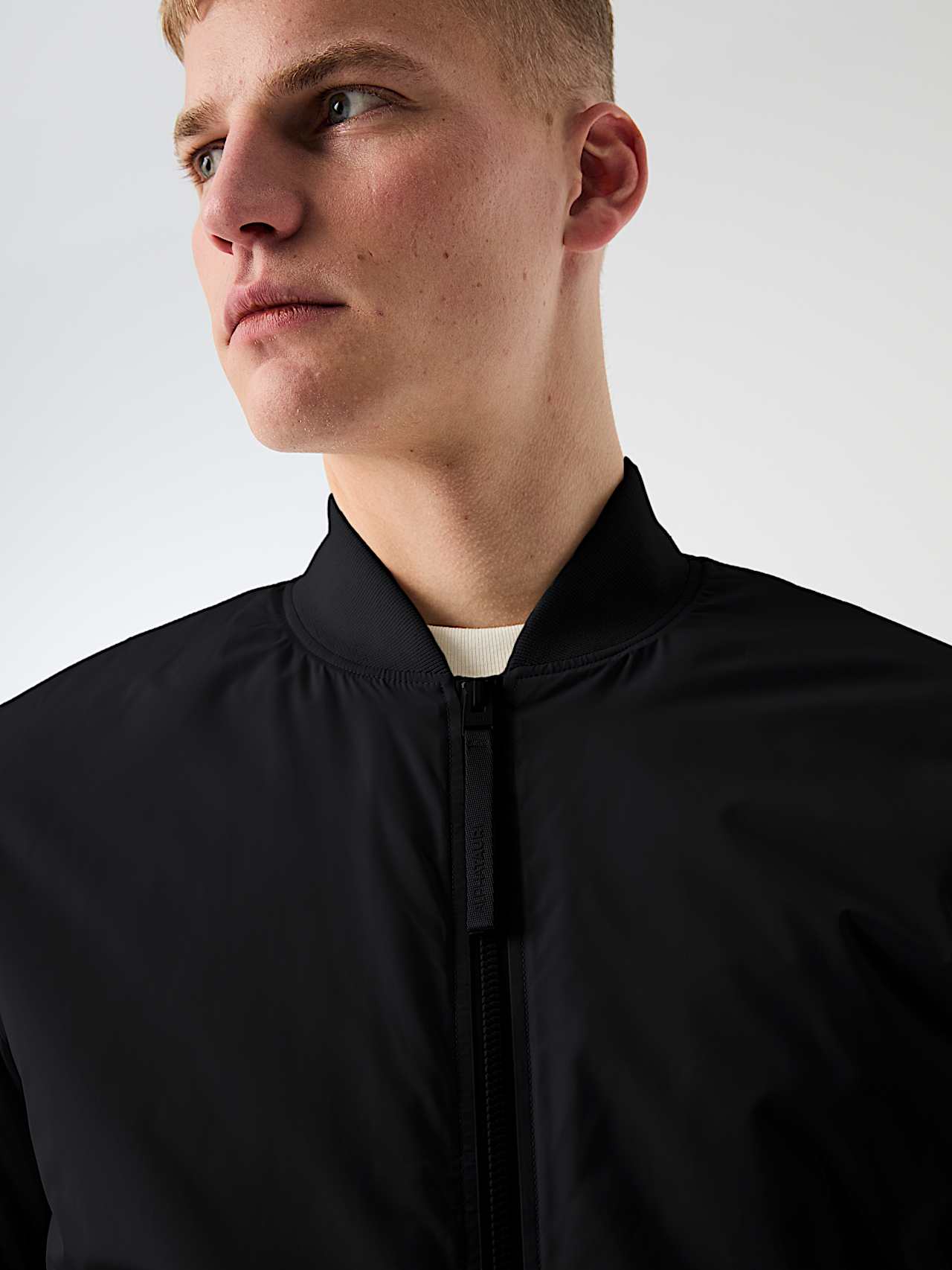 AlphaTauri | OUBLIS V1.Y10.02 | Wasserabweisende, leicht wattierte Bomberjacke mit Primaloft® in Schwarz für Herren