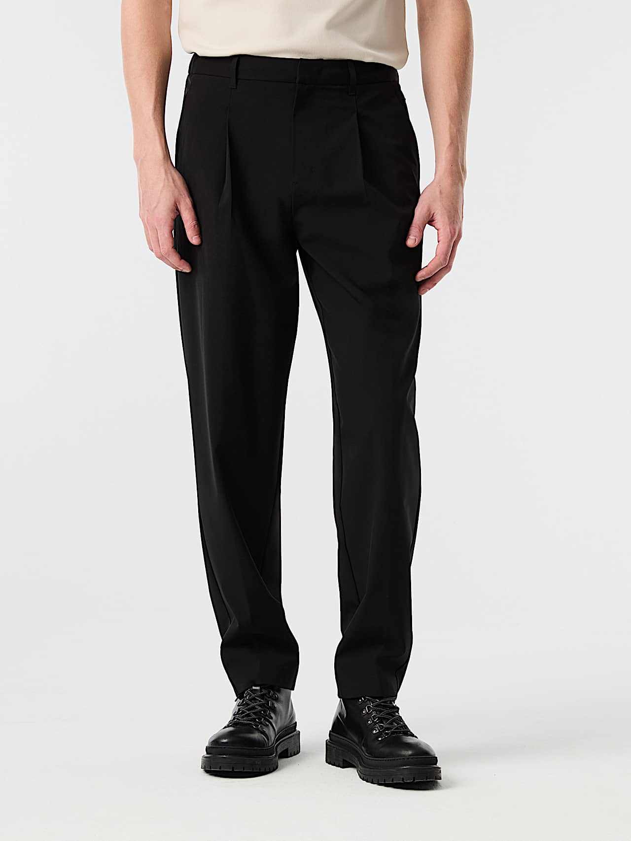 AlphaTauri | PANNS V1.Y10.02 | Elegant Stretch Carrot Fit Trousers in Black for Homme