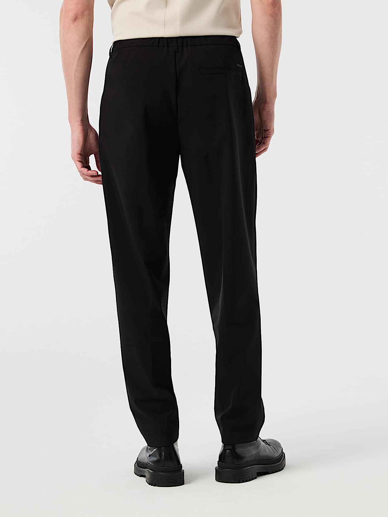 AlphaTauri | PANNS V1.Y10.02 | Elegant Stretch Carrot Fit Trousers in Black for Homme