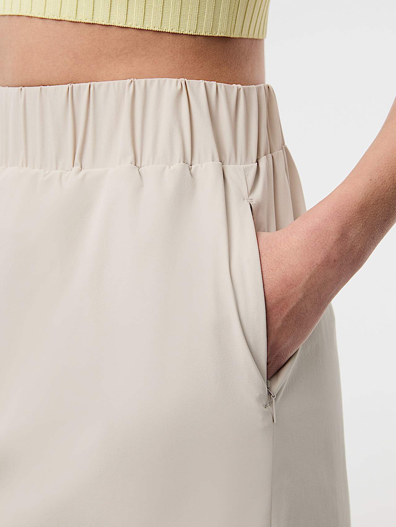AlphaTauri | WAVY V1.Y10.01 | Performance Stretch Mini Skirt in Stone for Women
