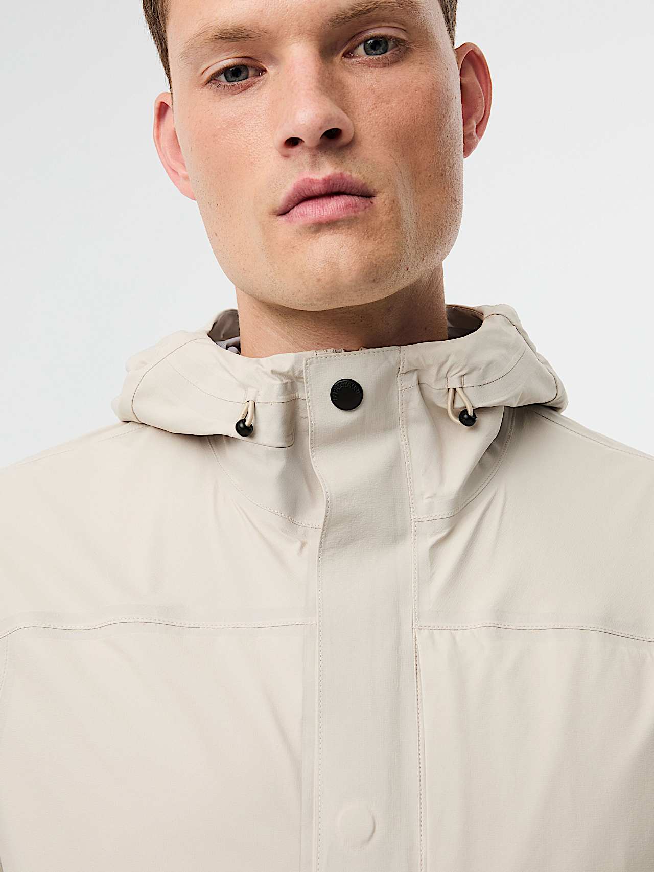 AlphaTauri | ORIS V1.Y10.01 | Leichte Tauroshield® Packable Jacke in Stone für Herren