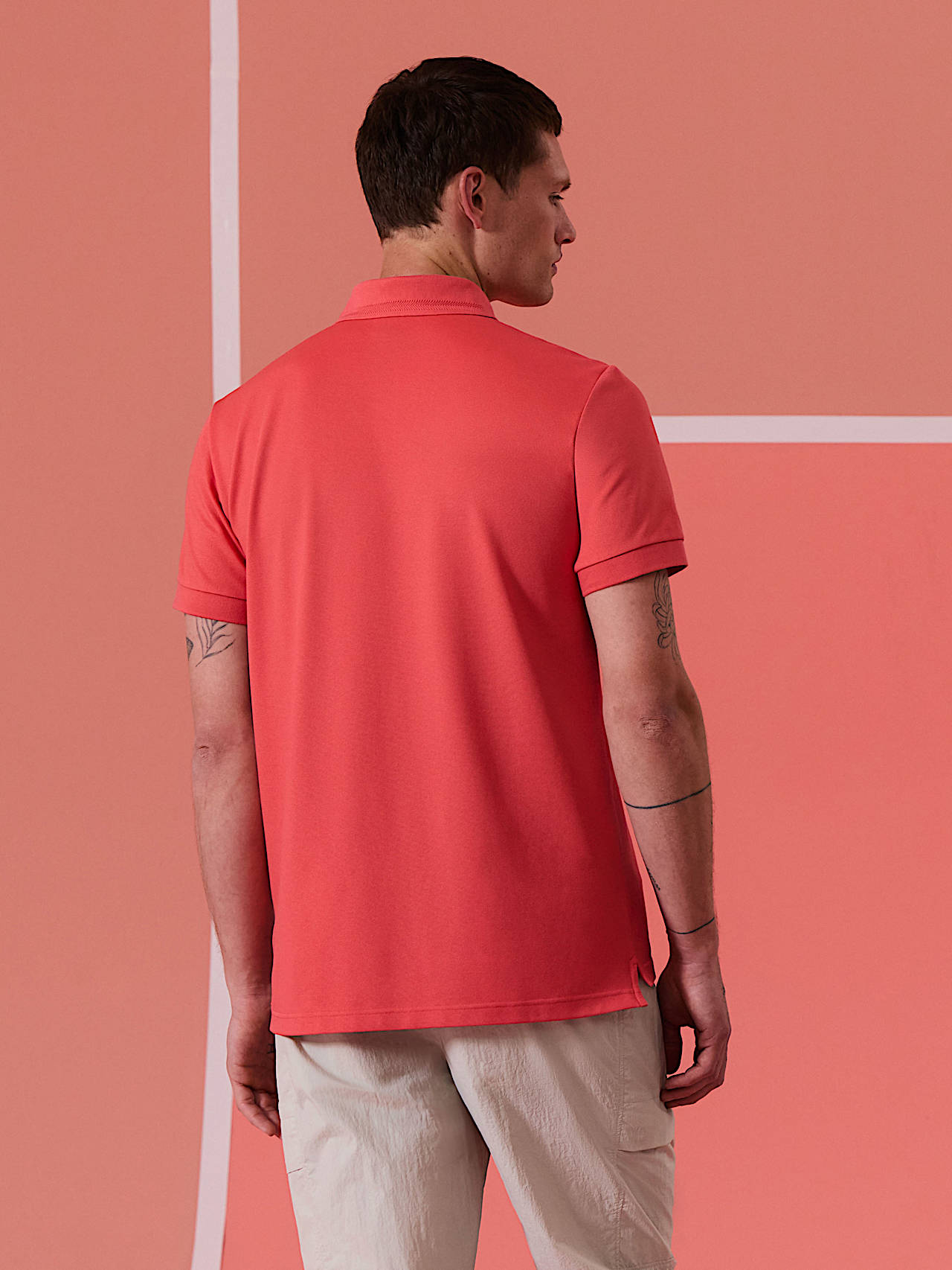 AlphaTauri | JESH V1.Y10.01 | Polo in piqué di misto cotone in Deep Peach for Uomo AlphaTauri | JESH V1.Y10.01 | Polo in piqué di misto cotone in Deep Peach for Uomo