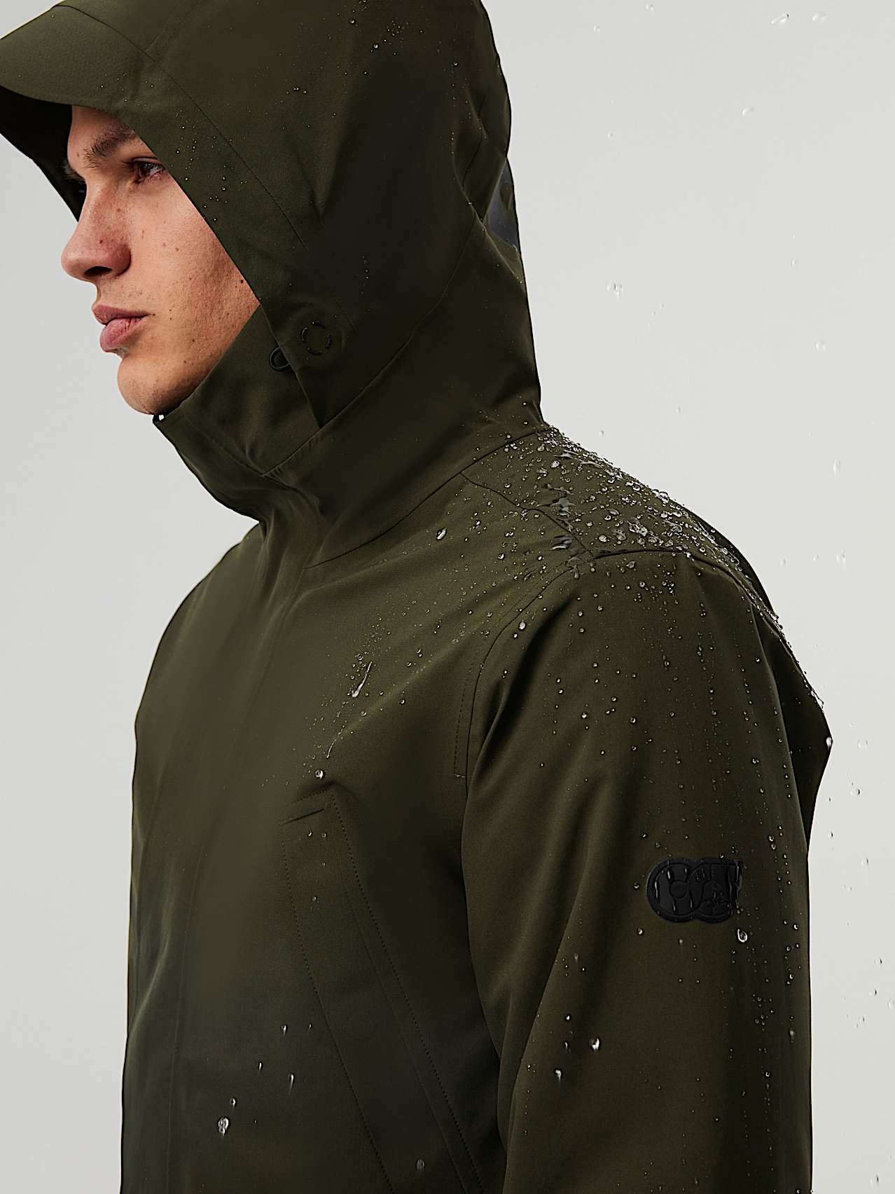 AlphaTauri | KOOV V8.Y6.02 | Iconic packable-travel-feature Waterproof Taurobran® Parka in Dark Green for Men