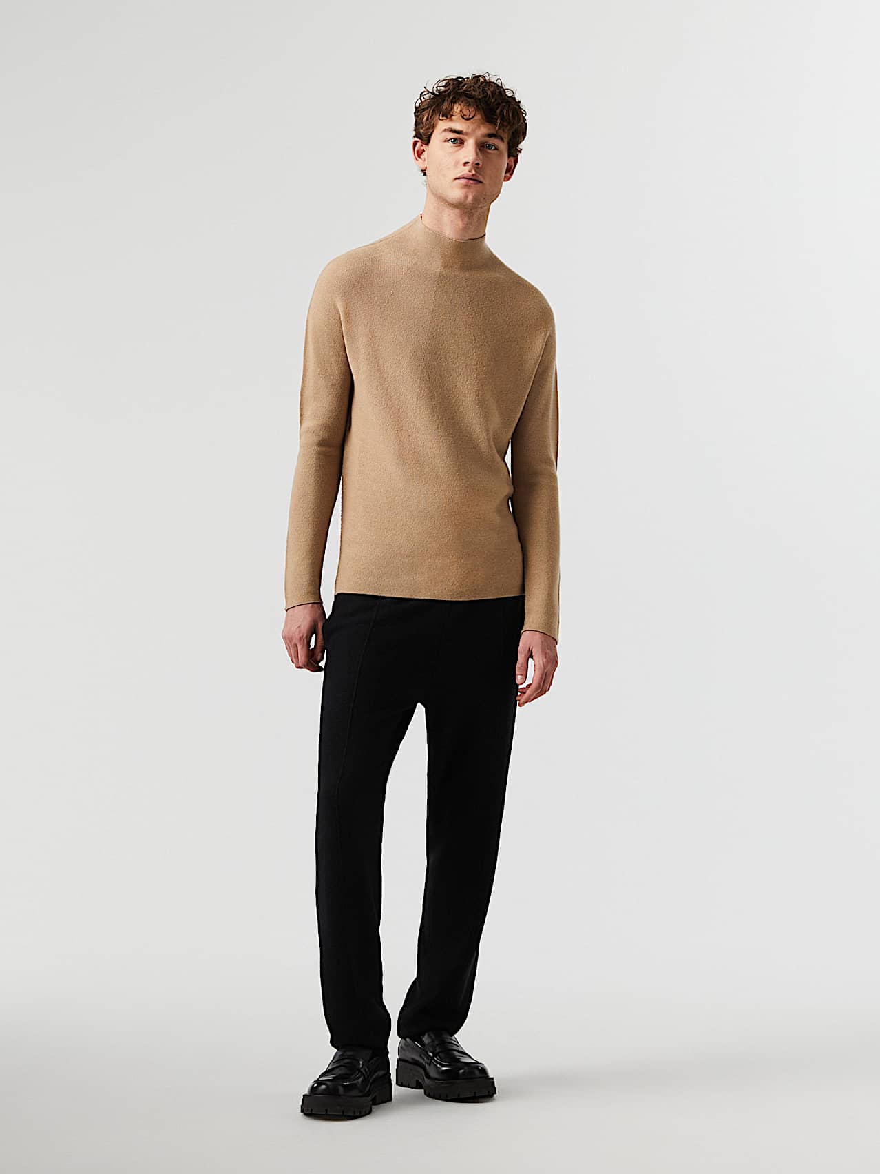 AlphaTauri | PANOV V1.Y7.02 | Felted Merino Wool Knit Trousers in Black for Men