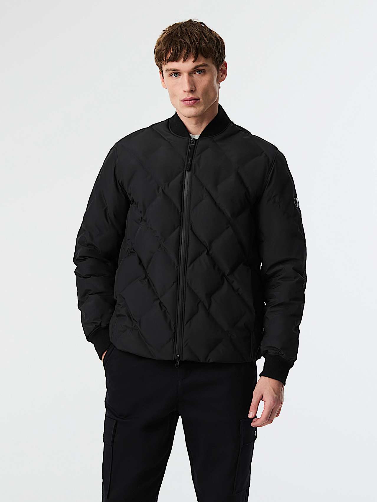 AlphaTauri | OCTAL V1.Y9.02 | Giacca bomber trapuntata Primaloft® in Black for Uomo