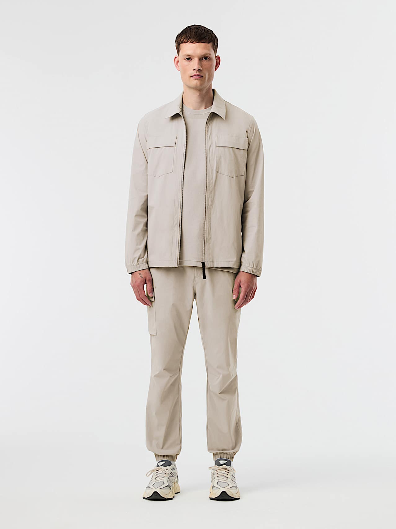 AlphaTauri | PLIX V1.Y10.01 | Pantalones cargo elásticos de alto rendimiento in Stone for Hombre
