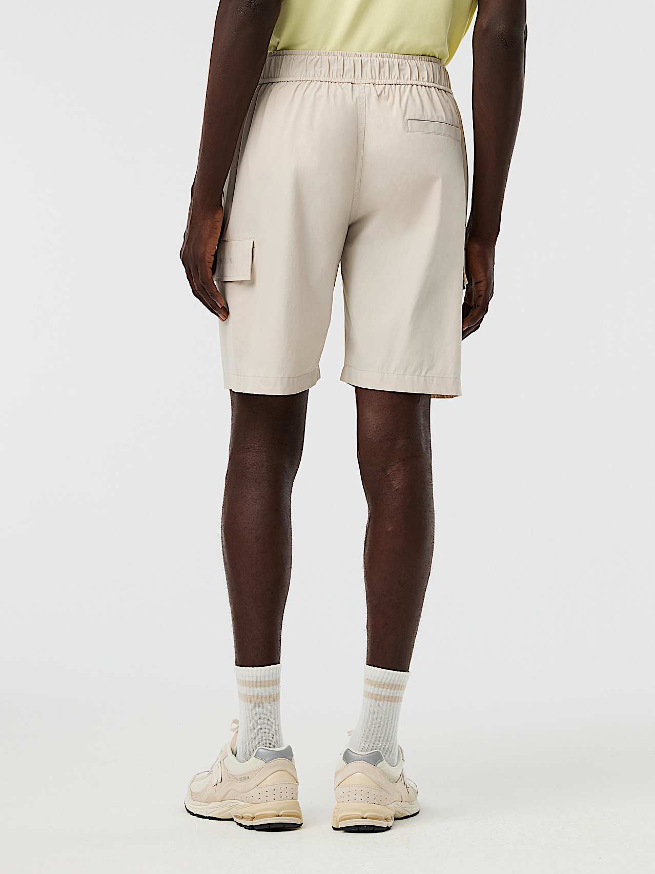 AlphaTauri | PLEX V1.Y10.01 | Pantaloncini cargo elasticizzati ad alte prestazioni in Stone for Uomo