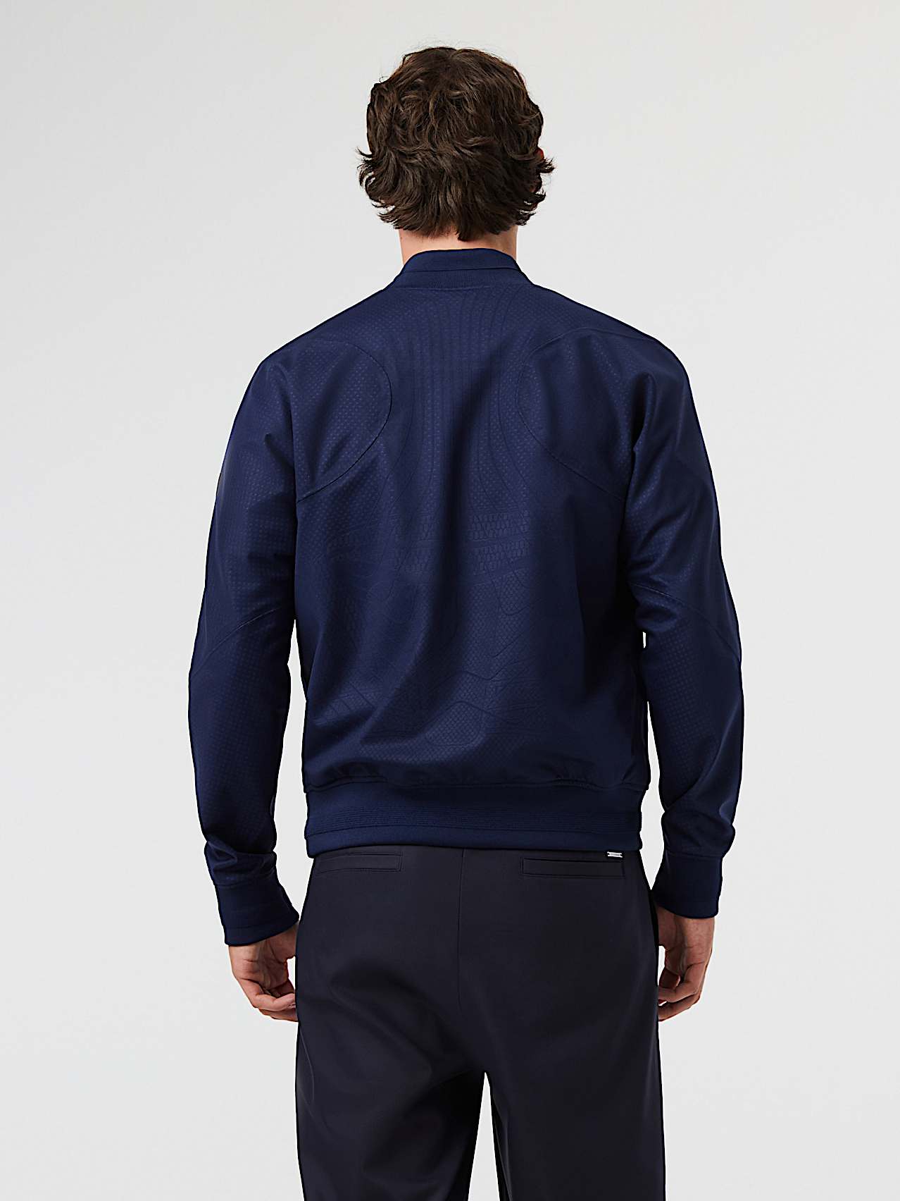 AlphaTauri | OPSTO V1.Y6.03 | Chaqueta Warpknit de Taurobran® confeccionada en una sola pieza in Azul Marino for Hombre