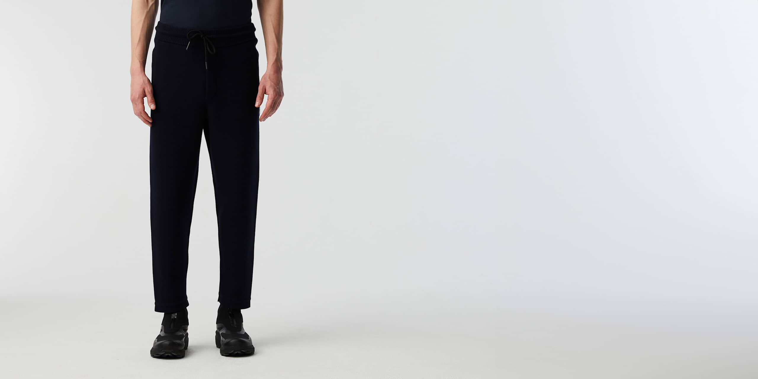 AlphaTauri | PANIV V2.Y8.02 | Performance Knit Trousers in Navy for Men