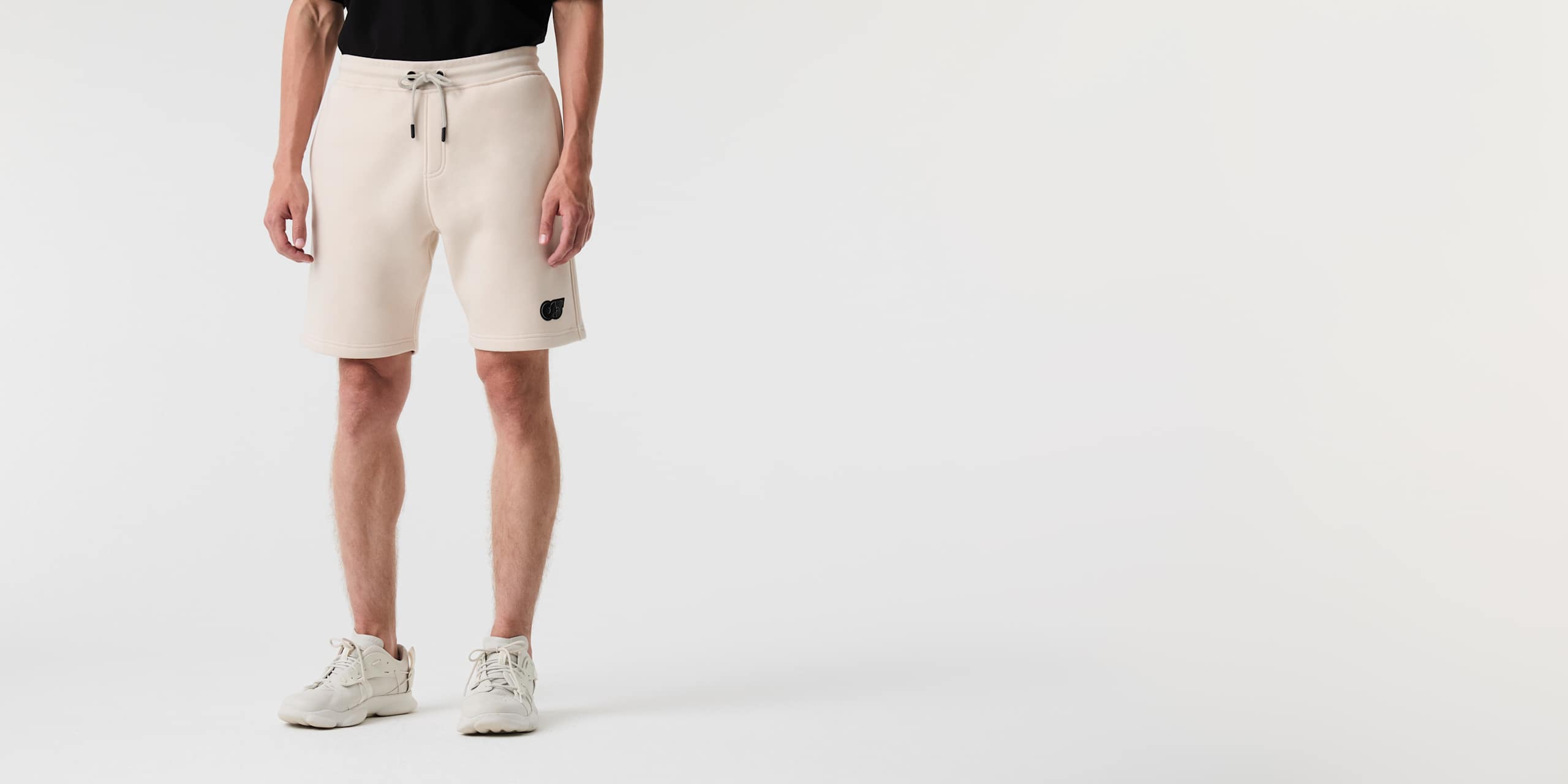 AlphaTauri | PHARS V1.Y9.01 | Sweatshorts mit charakteristischem Logo in Stone für Herren AlphaTauri | PHARS V1.Y9.01 | Sweatshorts mit charakteristischem Logo in Stone für Herren